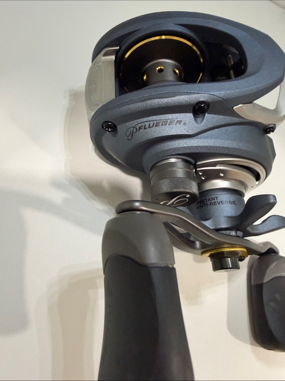 Pflueger Gray Left-Hand Baitcasting Reel - Precision Fishing Reel